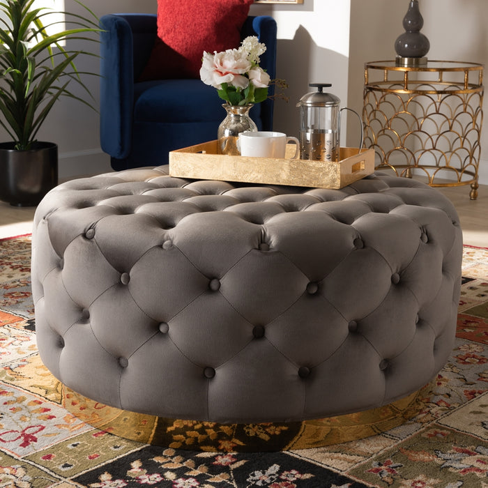 Sasha Glam and Luxe Grey Velvet Fabric Upholstered Gold Finished Round Cocktail Ottoman