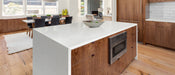 Carrara Delphi quartz countertop kitchen scene