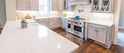 Cashmere Carrara quartz countertop kitchen scene
